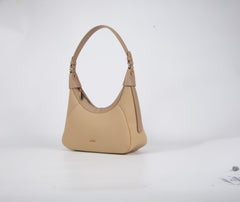 A petite women's handbag with an elegant design - coffee