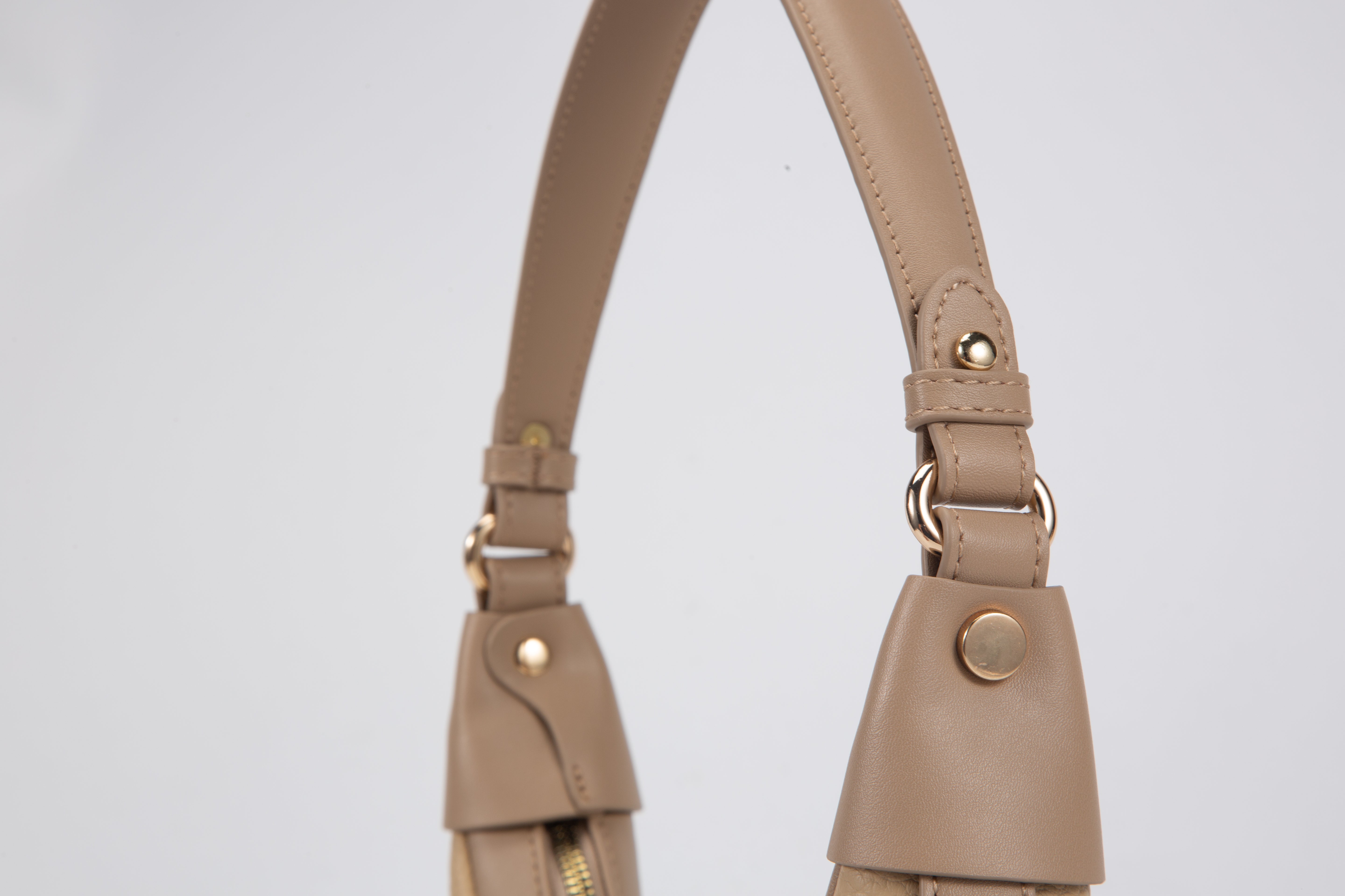 A petite women's handbag with an elegant design - coffee