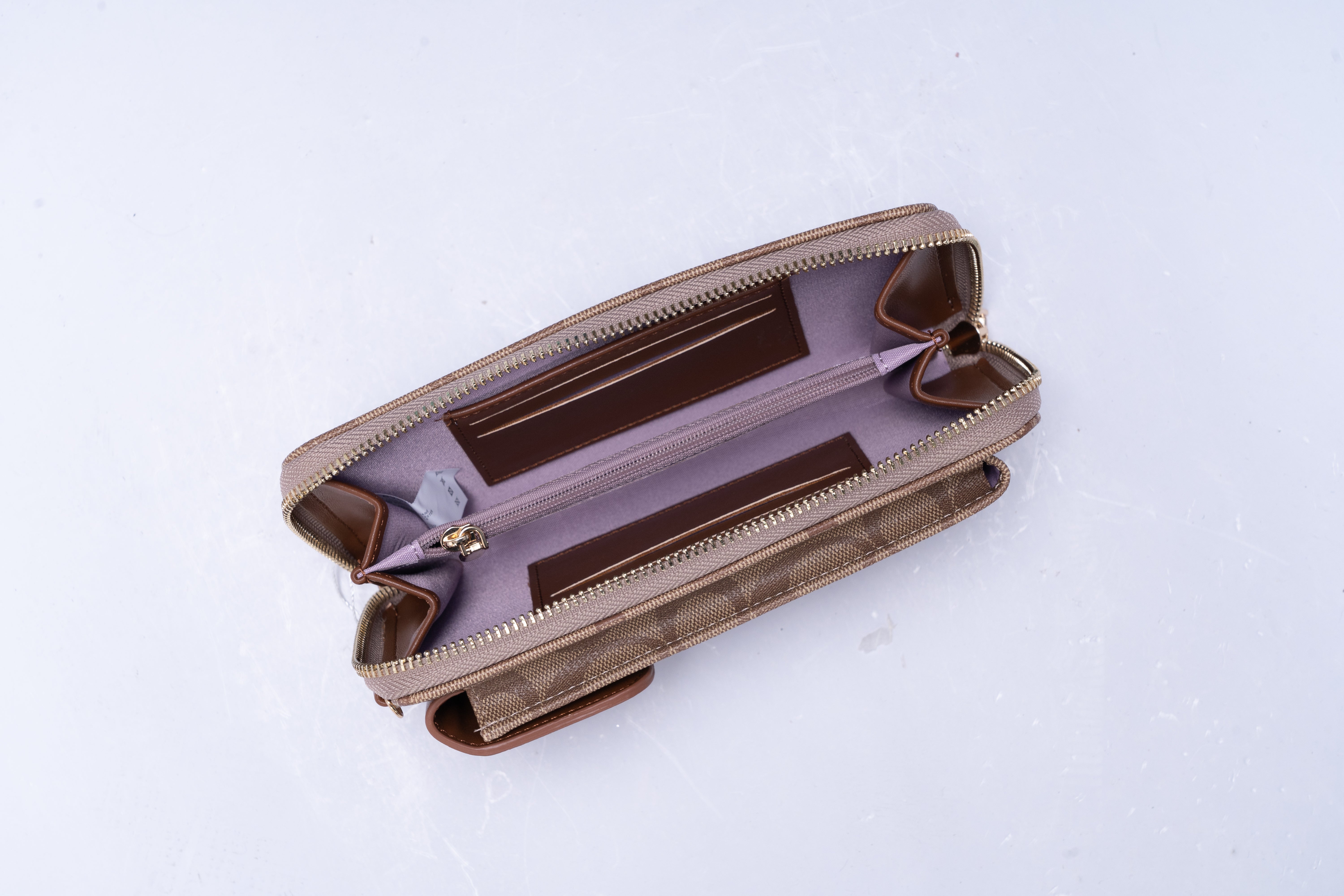 A stylish and elongated leather wallet - brown