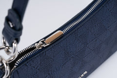 Elegant and practical black women's handbag that complements your look. Small with a stylish navy blue design.